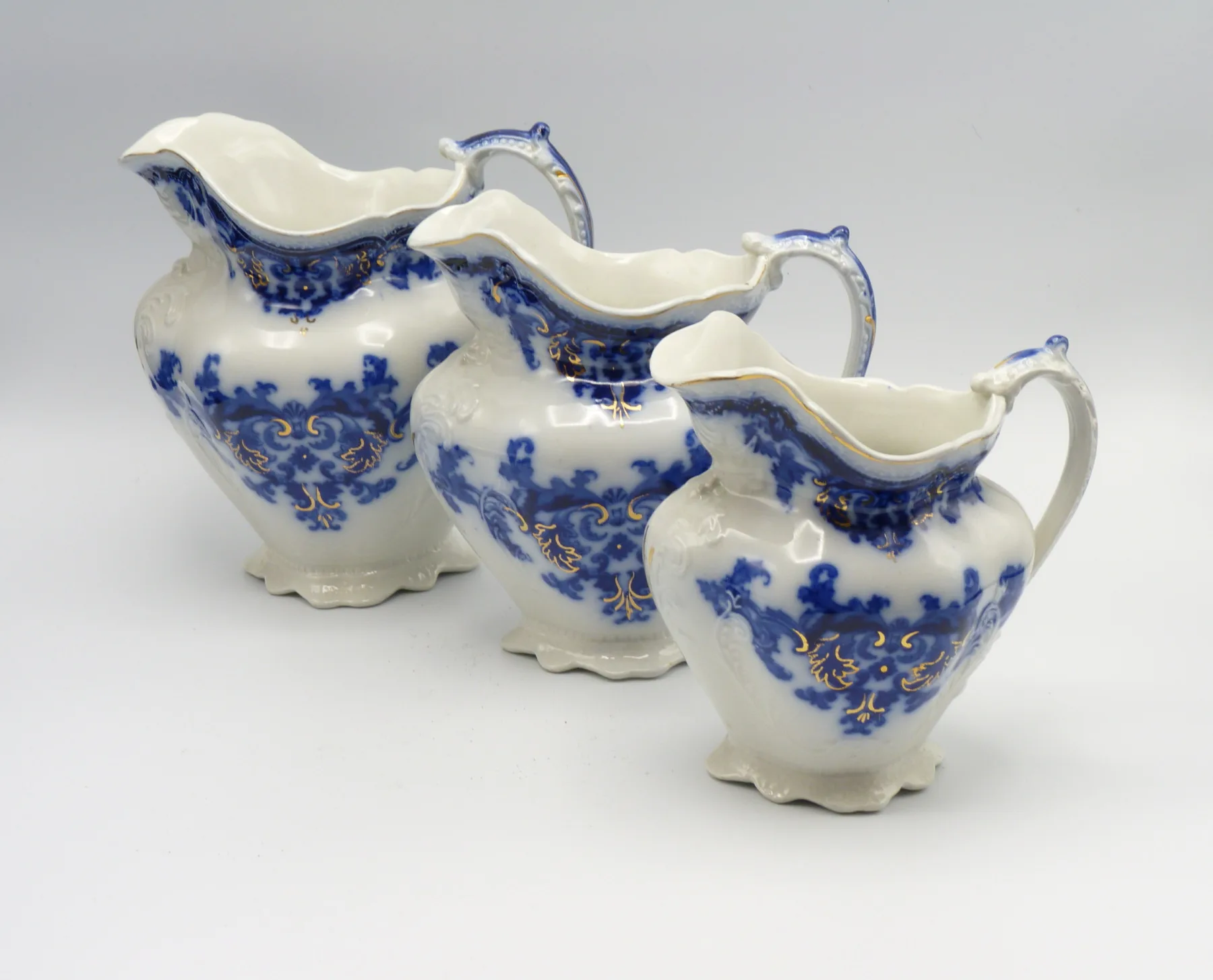 Flow Blue 3 Graduating Georgia Jugs - Johnson Bros.