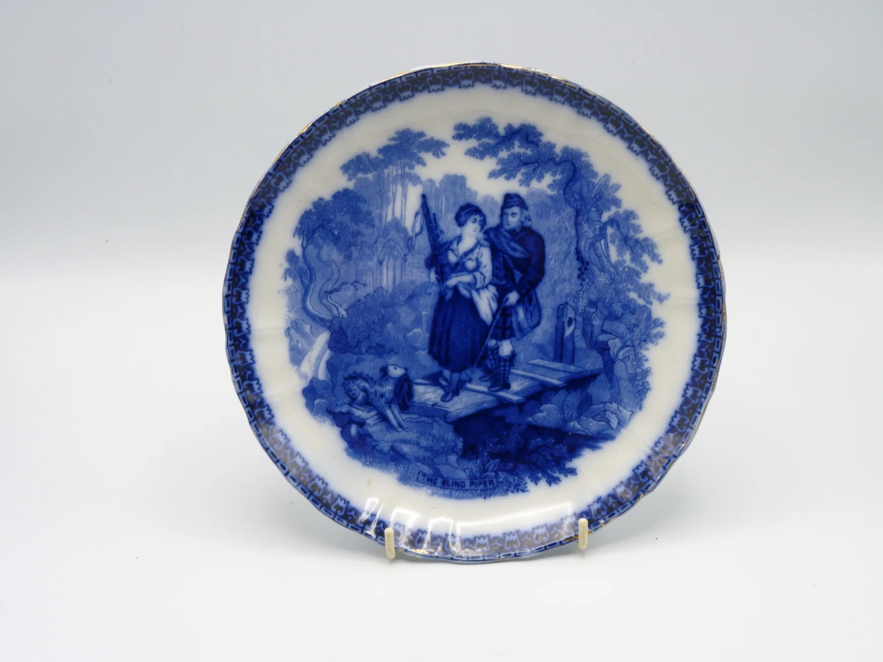Flow Blue Plate "The Blind Piper"