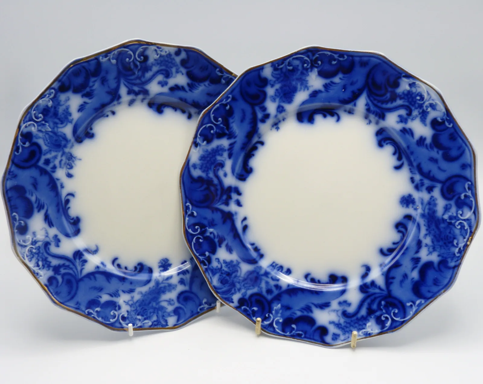 A Pair Of Flow Blue Argyle Dinner Plates