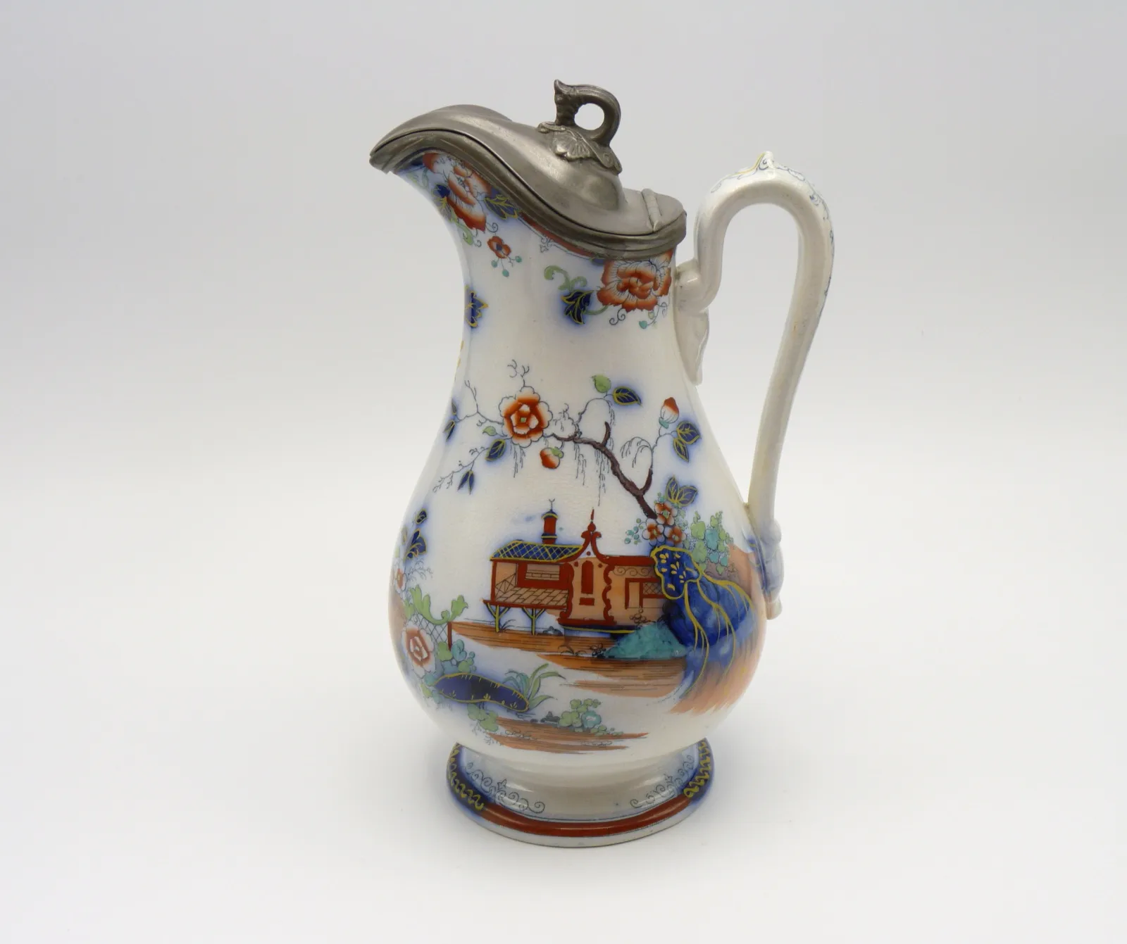 Flow Blue Polychrome Syrup Pitcher