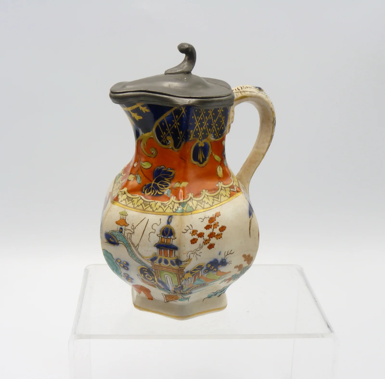 Orange Ground and Polychrome Small Syrup Pitcher