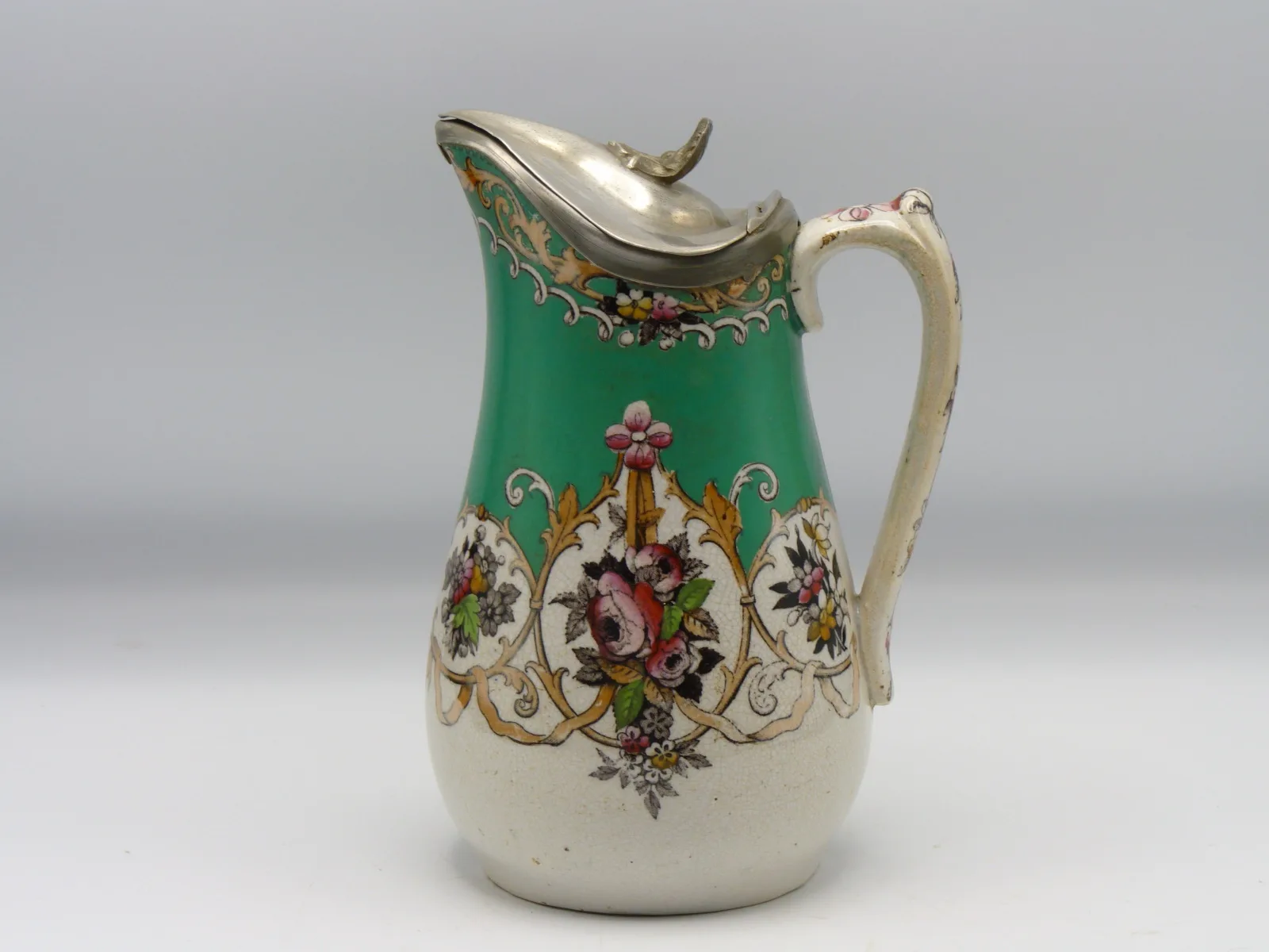 Green Ground Polychrome Syrup Pitcher