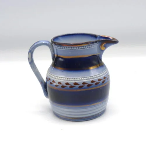 Small Flow Blue Creamer - Wagon Wheel