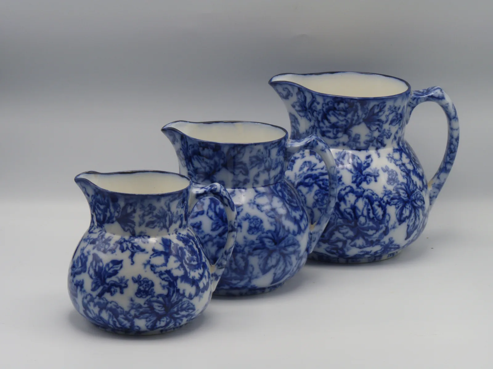 Beautiful set of Flow Blue Graduating Set Of Jugs - Cavendish