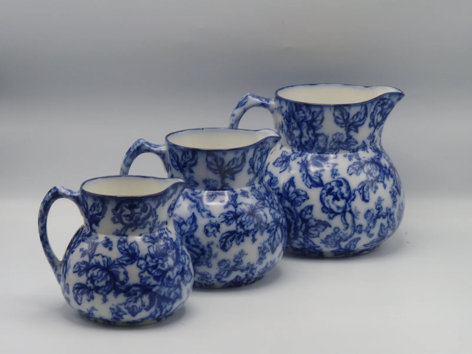 Beautiful set of Flow Blue Graduating Set Of Jugs - Cavendish - Image 2