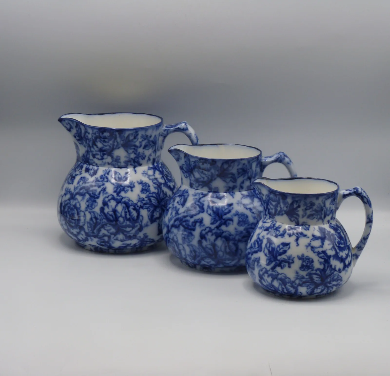 Beautiful set of Flow Blue Graduating Set Of Jugs - Cavendish - Image 4
