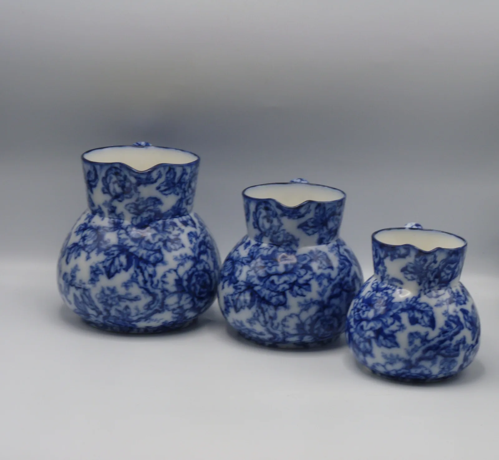 Beautiful set of Flow Blue Graduating Set Of Jugs - Cavendish - Image 8