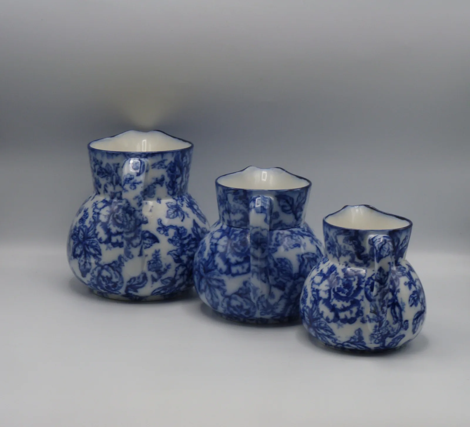 Beautiful set of Flow Blue Graduating Set Of Jugs - Cavendish - Image 9