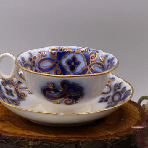 Stunning Victorian Flow Blue Gold Hand Decorated Cup & Saucer