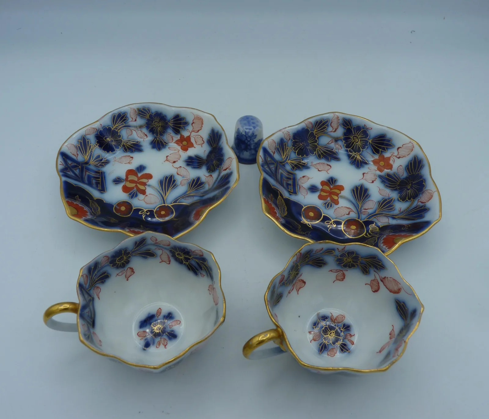 Pair of Flow Blue Polychrome Highlighted with gold Miniature Cups and Saucers - Image 4