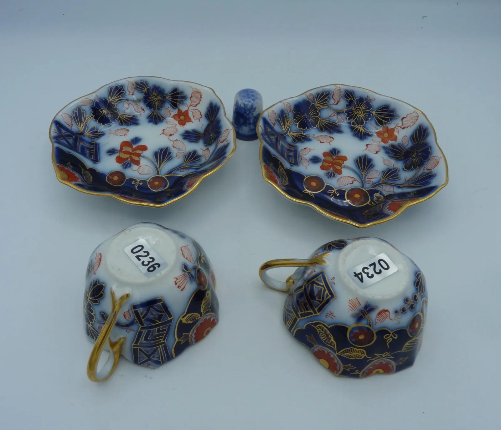 Pair of Flow Blue Polychrome Highlighted with gold Miniature Cups and Saucers - Image 3